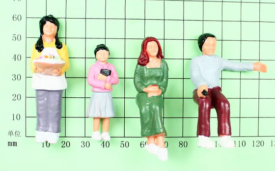 La gente architettonica del nero/rossa scala del modello modella le figure della gente fornitore