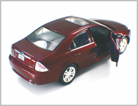 Le mini automobili di modello su ordinazione rosso scuro fuse sotto pressione 2006 della scala della lega guadano la fusione come regalo fornitore