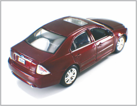 Le mini automobili di modello su ordinazione rosso scuro fuse sotto pressione 2006 della scala della lega guadano la fusione come regalo fornitore